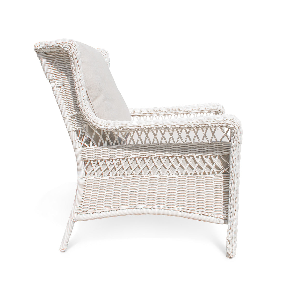 Park Meadows Wicker Outdoor Club Chair viewed from the right side, highlighting the diamond weave details and wide armrests. Oakville, ON.