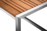 Close-up corner view of the Acacia coffee table showcasing the teak wood grain and stainless steel frame detail.