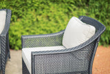 Close-up view of Camus wicker outdoor chair with plush Sunbrella® cushions, all-weather resin wicker, and powder-coated aluminum frame.