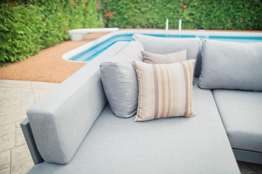 The sectional set displayed from the middle, showcasing its sleek design and comfortable seating for outdoor relaxation.